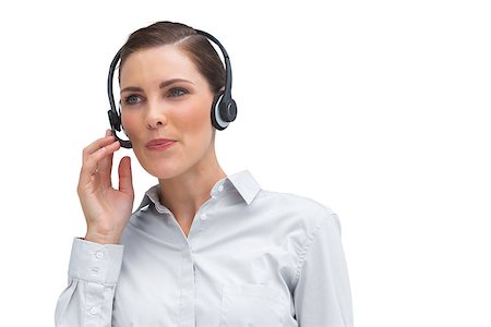 simsearch:400-06883455,k - Businesswoman working with headset on a white background Photographie de stock - Aubaine LD & Abonnement, Code: 400-06883663