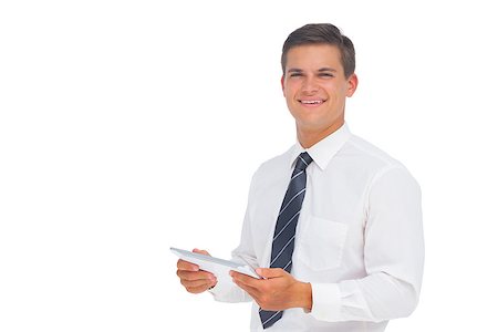 simsearch:400-06883455,k - Happy businessman using tablet and looking at camera on white background Photographie de stock - Aubaine LD & Abonnement, Code: 400-06883745