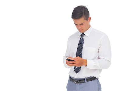 simsearch:400-07139155,k - Businessman texting on the phone on white background Stock Photo - Budget Royalty-Free & Subscription, Code: 400-06883740