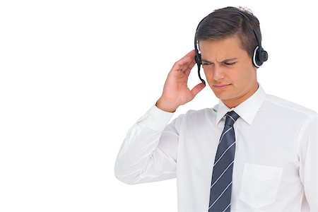 Call centre agent using headset and touching it on white background Stock Photo - Budget Royalty-Free & Subscription, Code: 400-06883751