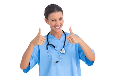 Surgeon smiling with thumbs up on white background Stock Photo - Budget Royalty-Free & Subscription, Code: 400-06883882