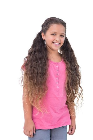 simsearch:400-06890095,k - Little girl smiling at camera on white background Stock Photo - Budget Royalty-Free & Subscription, Code: 400-06890075