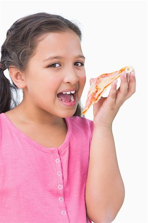 simsearch:400-06885115,k - Smiling little girl eating pizza on white background Photographie de stock - Aubaine LD & Abonnement, Code: 400-06890105