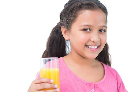 simsearch:400-06890095,k - Little girl drinking orange juice on white background Stock Photo - Budget Royalty-Free & Subscription, Code: 400-06890108