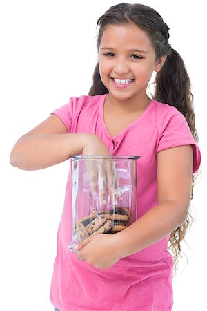 simsearch:400-06890095,k - Little girl taking a cookie from jar on white background Stock Photo - Budget Royalty-Free & Subscription, Code: 400-06890121