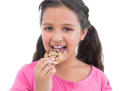 simsearch:400-06890095,k - Cute little girl eating a cookie on white background Stock Photo - Budget Royalty-Free & Subscription, Code: 400-06890123