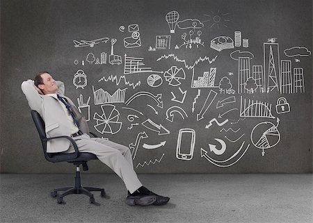 simsearch:400-07141016,k - Relaxed businessman sitting on a chair in front of a grey wall with graphs charts and illustrations Stockbilder - Microstock & Abonnement, Bildnummer: 400-06890216