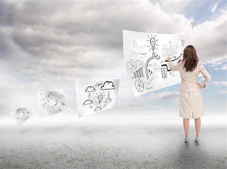 simsearch:400-06890406,k - Businesswoman drawing on a paper floating with blue sky on the background Stock Photo - Budget Royalty-Free & Subscription, Code: 400-06890390