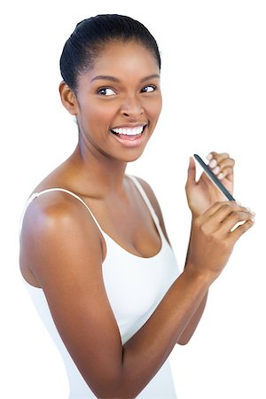 simsearch:400-06890736,k - Smiling woman using nail file on white background Stock Photo - Budget Royalty-Free & Subscription, Code: 400-06890718