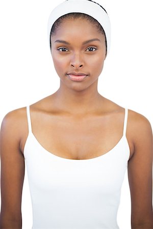 simsearch:400-06890736,k - Serious woman wearing white headband on white background Stock Photo - Budget Royalty-Free & Subscription, Code: 400-06890788
