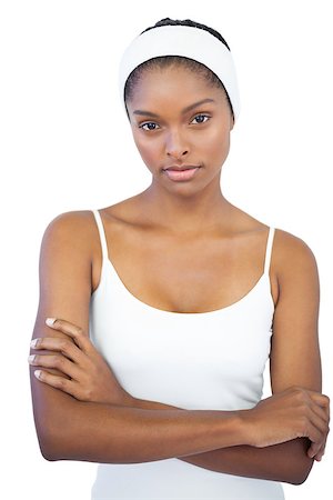 simsearch:400-06890736,k - Woman with headband crossing her arms on white background Stock Photo - Budget Royalty-Free & Subscription, Code: 400-06890790