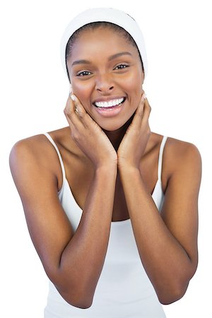 Cheerful woman with headband crossing her arms on white background Stock Photo - Budget Royalty-Free & Subscription, Code: 400-06890792