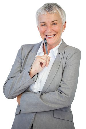 simsearch:614-07240033,k - Smiling businesswoman holding pen on white background Photographie de stock - Aubaine LD & Abonnement, Code: 400-06890885