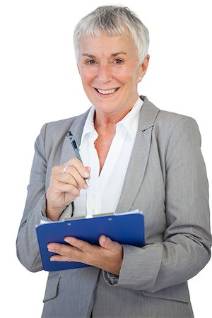 Happy businesswoman using her clipboard on white background Stock Photo - Budget Royalty-Free & Subscription, Code: 400-06890882