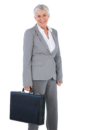 Businesswoman holding briefcase on white background Stock Photo - Budget Royalty-Free & Subscription, Code: 400-06890929