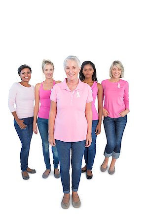 simsearch:400-06870717,k - Diverse group of happy women wearing pink tops and breast cancer ribbons on white background Stock Photo - Budget Royalty-Free & Subscription, Code: 400-06891597