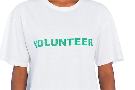 Woman wearing volunteer tshirt on white background Stockbilder - Microstock & Abonnement, Bildnummer: 400-06891629