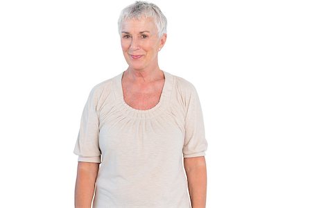 Mature woman smiling at camera on white background Stock Photo - Budget Royalty-Free & Subscription, Code: 400-06891655