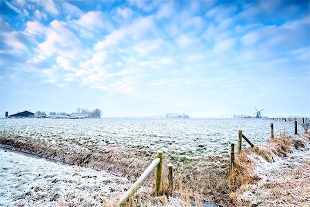 simsearch:400-06875459,k - view with farmhouse and windmill in winter, Netherlands Stock Photo - Budget Royalty-Free & Subscription, Code: 400-06891800
