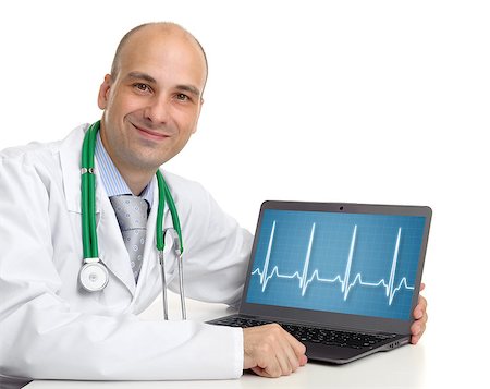 simsearch:400-04855182,k - doctor and a laptop computer with electrocardiogram on the screen Foto de stock - Royalty-Free Super Valor e Assinatura, Número: 400-06891937