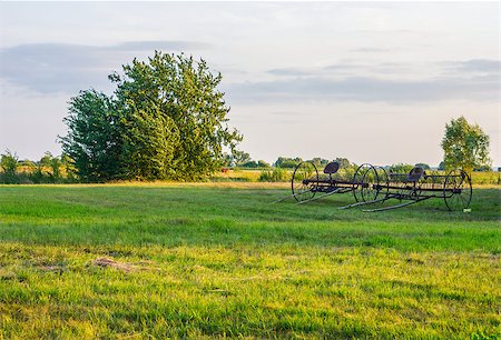 Big plough at field in in the countryside at rural area Stock Photo - Budget Royalty-Free & Subscription, Code: 400-06892003