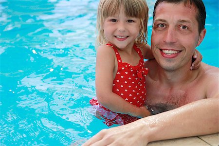 funny kids in the pool - Dad and little daughter playing in the water pool Stock Photo - Budget Royalty-Free & Subscription, Code: 400-06892049