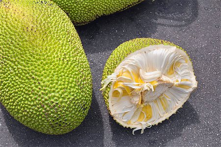 penang people - Jackfruit Whole and Open with Yellow Flesh for Sale at Outdoor Wet Market in Southeast Asia Stock Photo - Budget Royalty-Free & Subscription, Code: 400-06892436