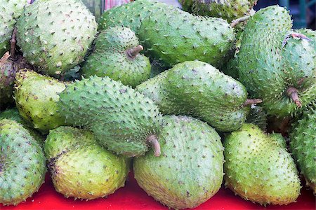 simsearch:400-06750784,k - Soursop piled up at Fruit Vendor Stall in Southeast Asia Photographie de stock - Aubaine LD & Abonnement, Code: 400-06892444