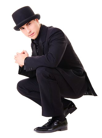 strebe - Young attractive man in black suit and hat isolated on white background Stock Photo - Budget Royalty-Free & Subscription, Code: 400-06914294