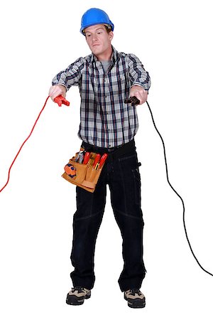 simsearch:400-07572493,k - Electrician holding cables Stock Photo - Budget Royalty-Free & Subscription, Code: 400-06914356
