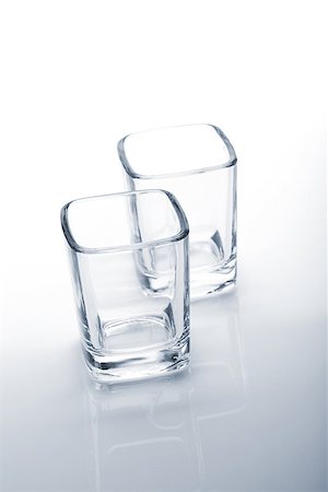 simsearch:400-06914465,k - Shot glasses. Blue toned Fotografie stock - Microstock e Abbonamento, Codice: 400-06914465