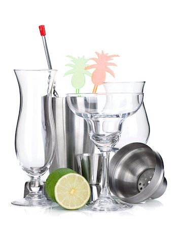 Cocktail shaker, glasses, utensils and lime. Isolated on white background Stock Photo - Budget Royalty-Free & Subscription, Code: 400-06914467