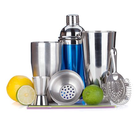 simsearch:400-06914551,k - Cocktail shaker, strainer, measuring cup, drinking straws and citruses. Isolated on white background Stock Photo - Budget Royalty-Free & Subscription, Code: 400-06914468