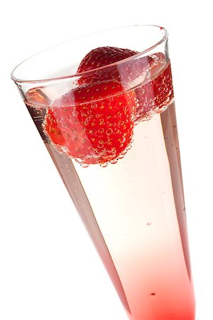 simsearch:400-06919155,k - Champagne with strawberry - christmas alcohol cocktail. Isolated on white background Stock Photo - Budget Royalty-Free & Subscription, Code: 400-06914461