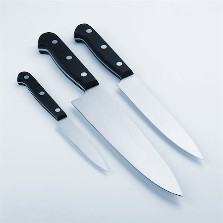 simsearch:400-05895238,k - Three kitchen knives. Blue toned Stockbilder - Microstock & Abonnement, Bildnummer: 400-06914631