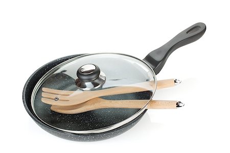 simsearch:400-06914473,k - Frying pan with glass cover and wooden utensils. Isolated on white background Foto de stock - Royalty-Free Super Valor e Assinatura, Número: 400-06914663