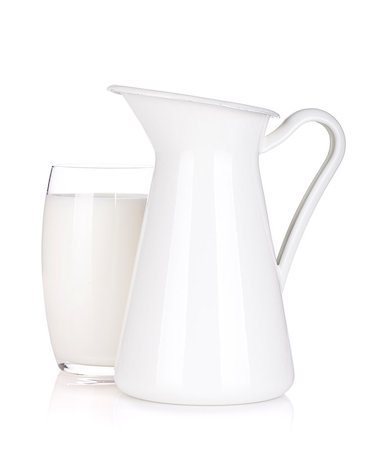 simsearch:400-04499805,k - Milk jug and glass. Isolated on white background Photographie de stock - Aubaine LD & Abonnement, Code: 400-06914740