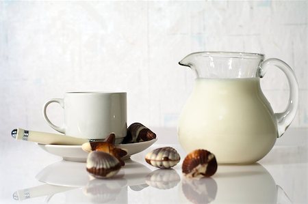 simsearch:400-07477800,k - White cup, milk and sweets on white background Stock Photo - Budget Royalty-Free & Subscription, Code: 400-06914783