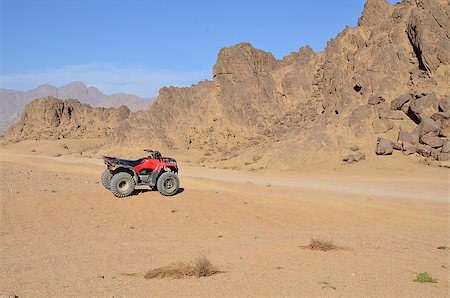 wheel of desert scooter arranged in a row Stockbilder - Microstock & Abonnement, Bildnummer: 400-06914966