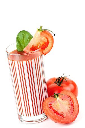 simsearch:400-06915457,k - Fresh tomato juice with basil isolated on white background Photographie de stock - Aubaine LD & Abonnement, Code: 400-06915344
