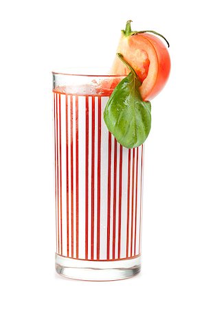 simsearch:400-06915457,k - Fresh tomato juice with basil isolated on white background Photographie de stock - Aubaine LD & Abonnement, Code: 400-06915346