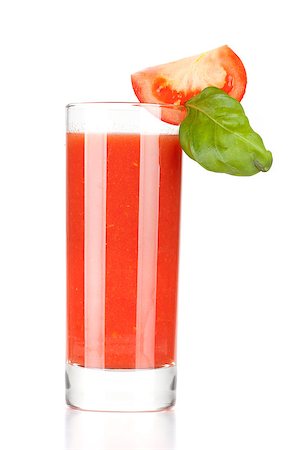simsearch:400-06915457,k - Fresh tomato juice with basil isolated on white background Photographie de stock - Aubaine LD & Abonnement, Code: 400-06915347