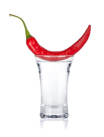 simsearch:400-06914551,k - Shot of vodka and red hot chili pepper. Isolated on white background Stock Photo - Budget Royalty-Free & Subscription, Code: 400-06915367