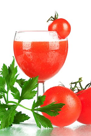 Fresh tomato juice with tomatos and celery Stock Photo - Budget Royalty-Free & Subscription, Code: 400-06915457