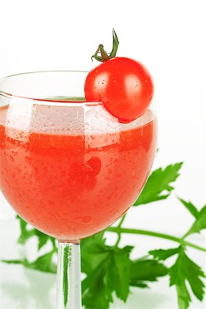 Fresh tomato juice with tomatos and celery Stock Photo - Budget Royalty-Free & Subscription, Code: 400-06915459