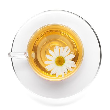simsearch:400-08186432,k - Cup of tea with chamomile flower. View from above. Isolated on white background Stock Photo - Budget Royalty-Free & Subscription, Code: 400-06915469