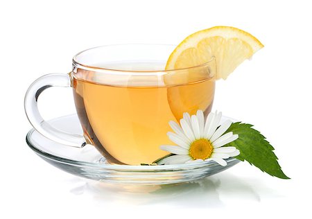 simsearch:400-08186432,k - Cup of tea with lemon slice, mint leaves and chamomile flower. Isolated on white background Stock Photo - Budget Royalty-Free & Subscription, Code: 400-06915494