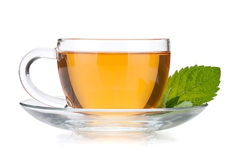 simsearch:400-08186432,k - Cup of tea with mint leaves. Isolated on white background Stock Photo - Budget Royalty-Free & Subscription, Code: 400-06915491