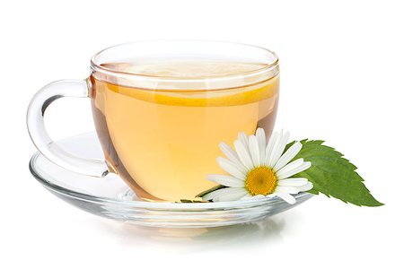 simsearch:400-08186432,k - Cup of tea with lemon slice, mint leaves and chamomile flower. Isolated on white background Stock Photo - Budget Royalty-Free & Subscription, Code: 400-06915493
