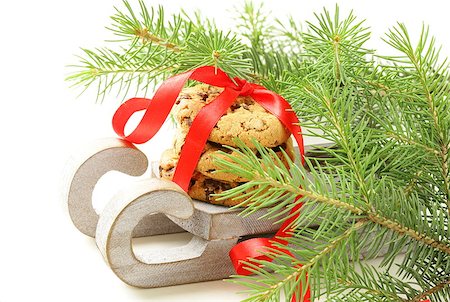 simsearch:400-04145237,k - Christmas cookies with red ribbon and green fir Foto de stock - Royalty-Free Super Valor e Assinatura, Número: 400-06915666